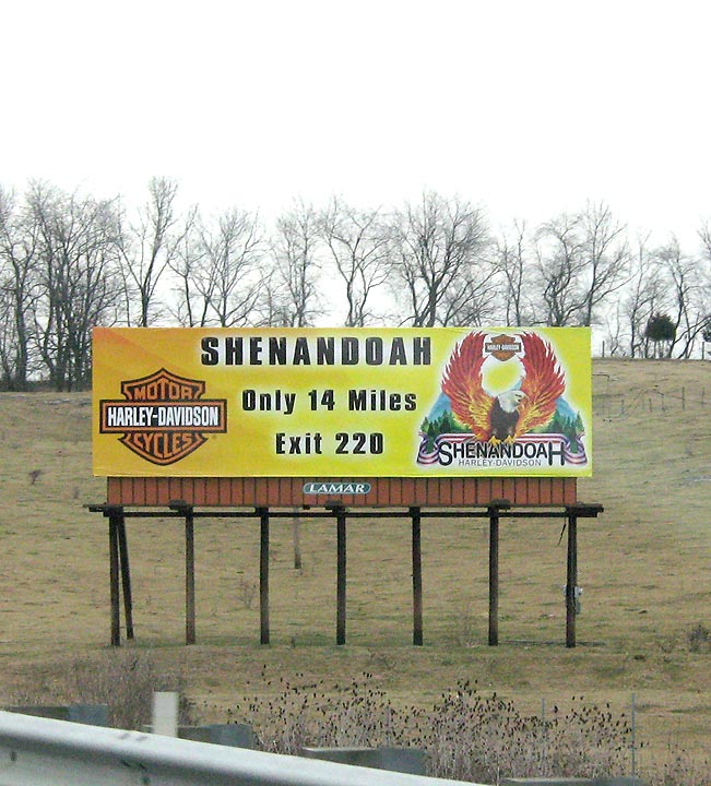 Here's the largest print of my artwork available... well at least the flaming eagle part. This was fun to see off to the side of Rte. 64 here in Virginia. If I climb up there and sign it, will it make the billboard more valuable?